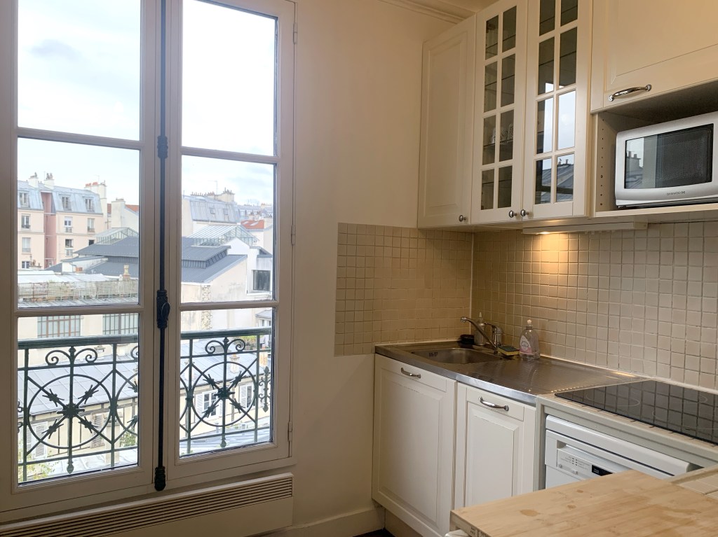Kitchen with Paris rooftop views