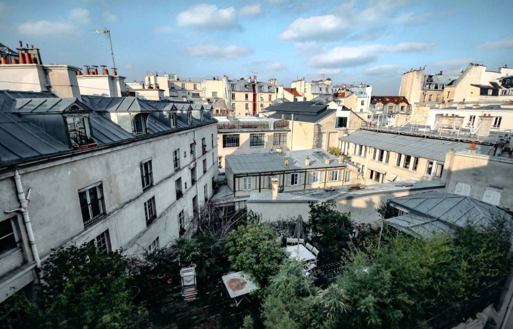 View over Paris rooftops from the apartment